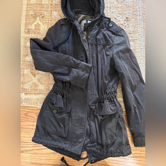 Black weather resistant mid-length jacket with quilted insert. - Picture 4 of 7